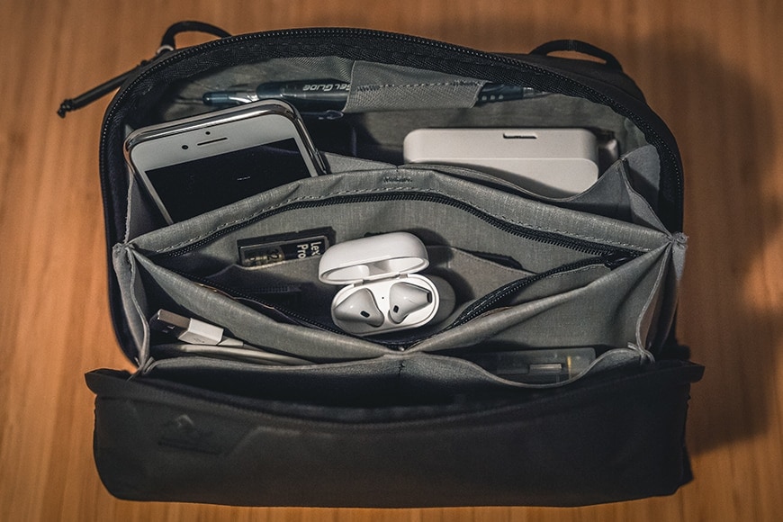 travel essentials can be fixed to attachment points on peak design tech pouch