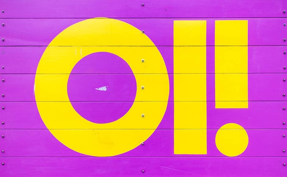 paint in bright hues on a sign