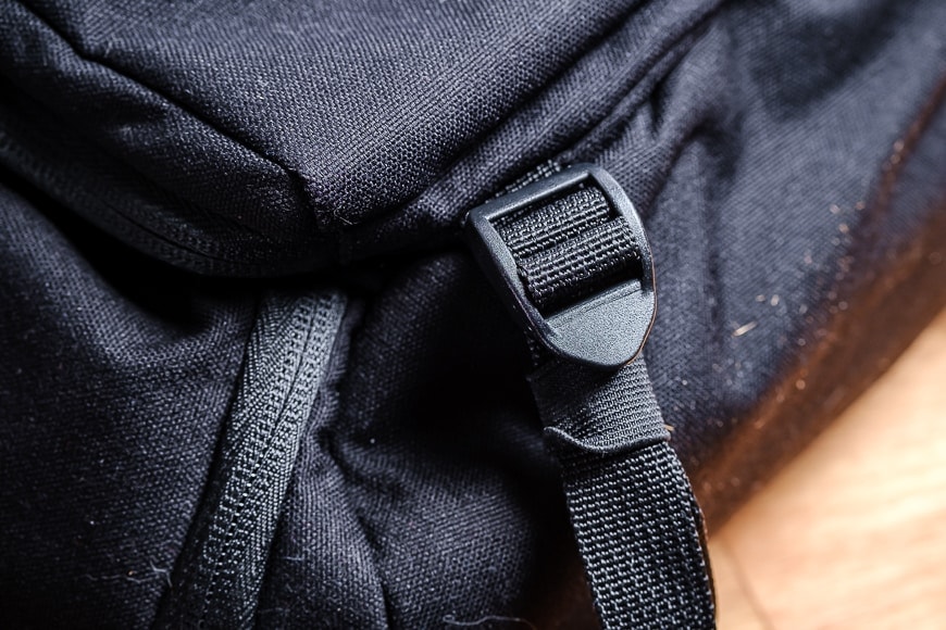 The Brevite Jumper features two luggage straps underneath the bag that are perfect for tying down a larger tripod.
