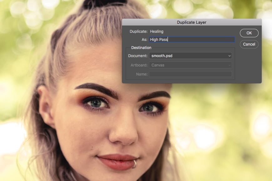 Step 3 is to duplicate layer - this will be your new smoothing skin layer in Photoshop.