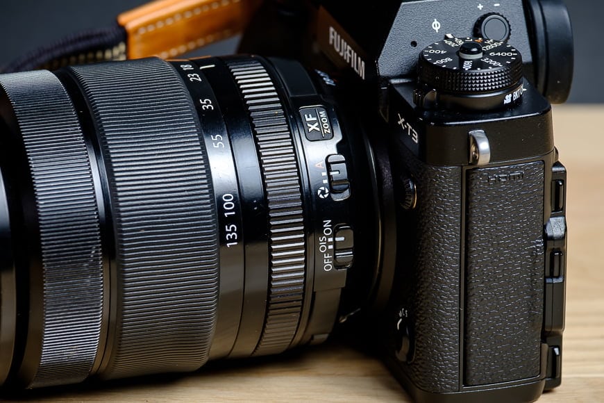 The XF 18-135mm f/3.5-5.6 features Optical Images Stabilisation and Aperture control switches.