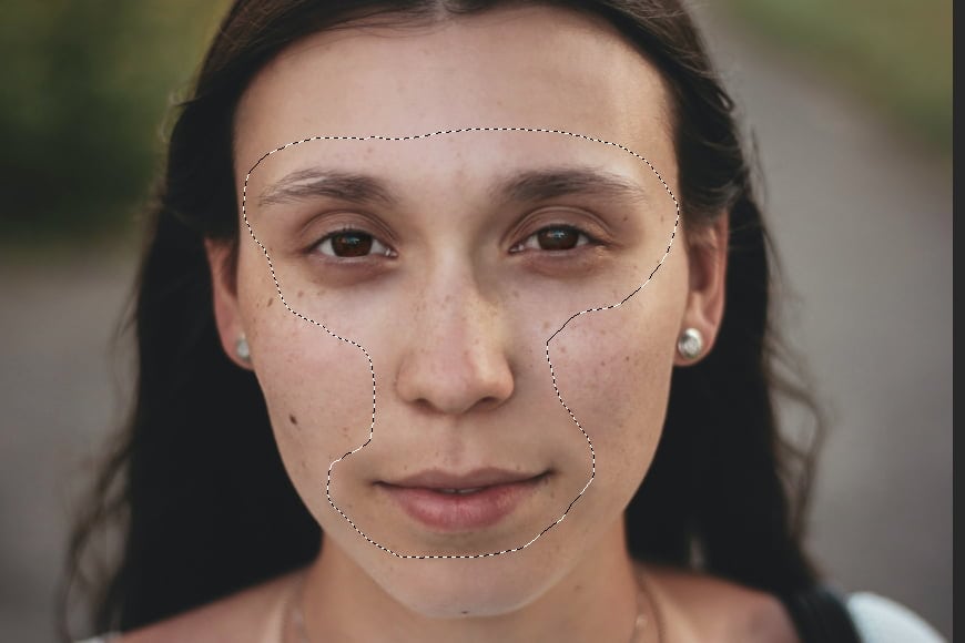 Use the lasso tool to select the features of the face.
