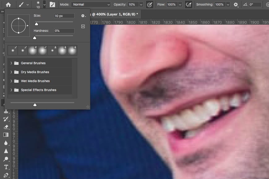 Whiter teeth photoshop tutorial: Use a brush to paint over the teeth in your image.