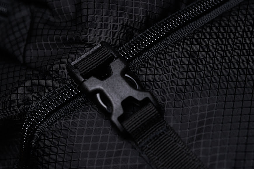 Additional fastening straps on the Pacsafe Camsafe X25 ensure that if you don't zip your bag completely, the straps will reduce the risk of your gear falling out.