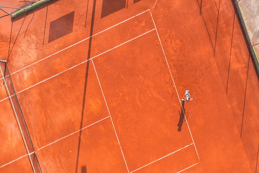 A drone camera used to capture a tennis game