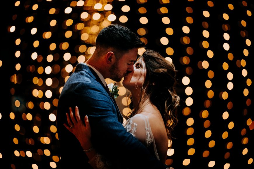 Photography - a couple kissing using backlight as background lighting