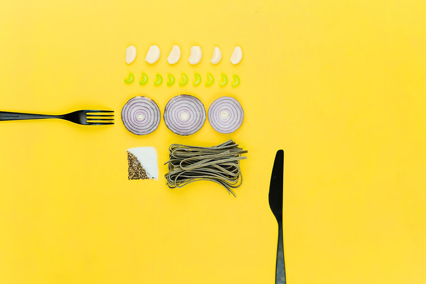 Commercial photography flat lay of food on yellow background