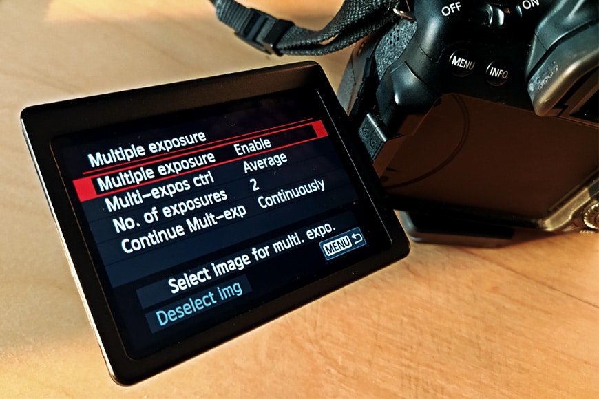 A cameras LCD screen showing how to enable multiple exposure