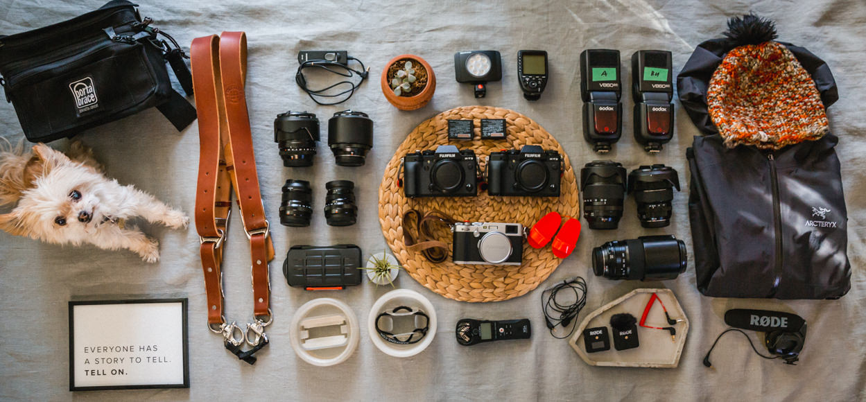 photography-gear-on-bed
