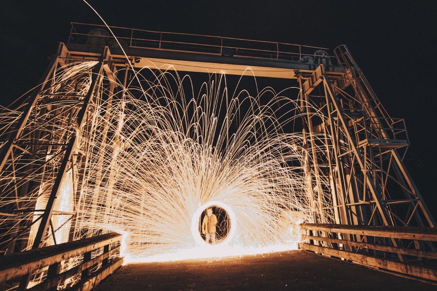 steel wool light photography on a bridge