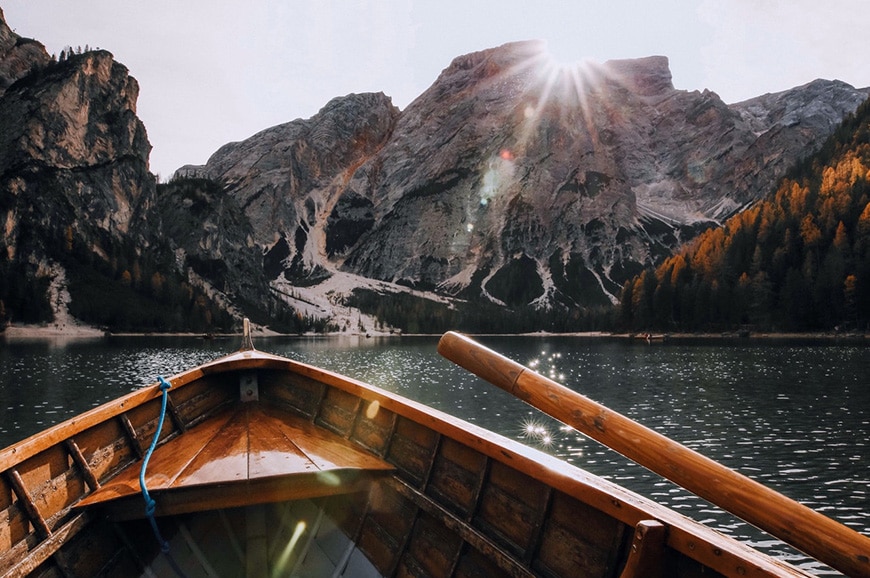 Forced perspective example of rowboat and mountains