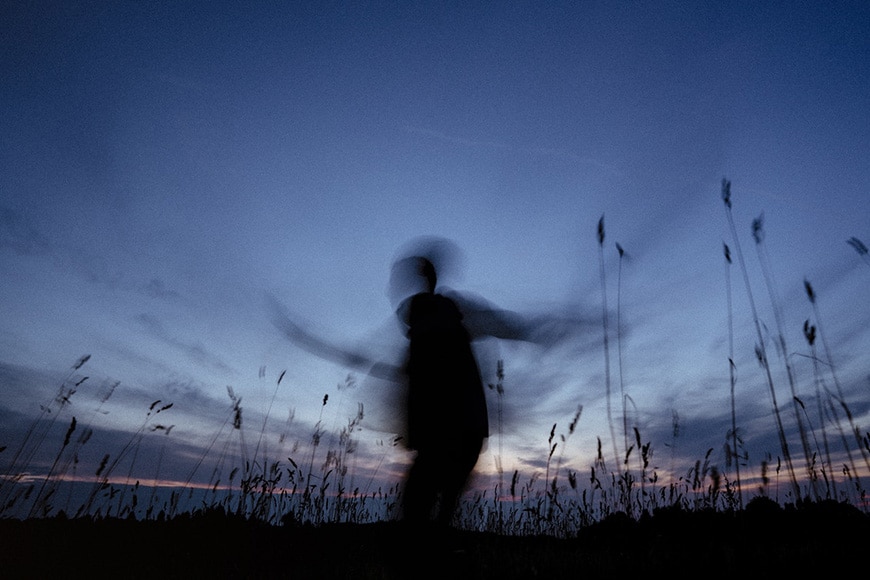 Motion blur man at dusk