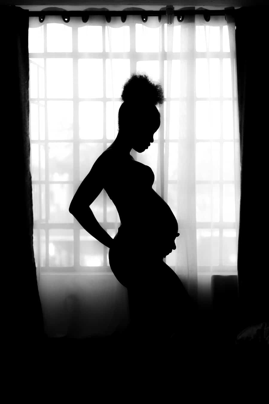 Pregnant form in silhouette
