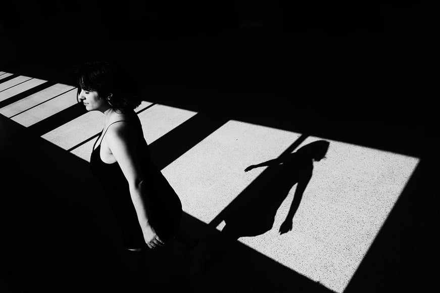Female subject against high contrasted shadows