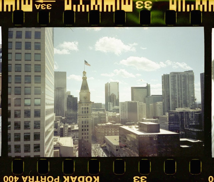 Film negative of city skyline