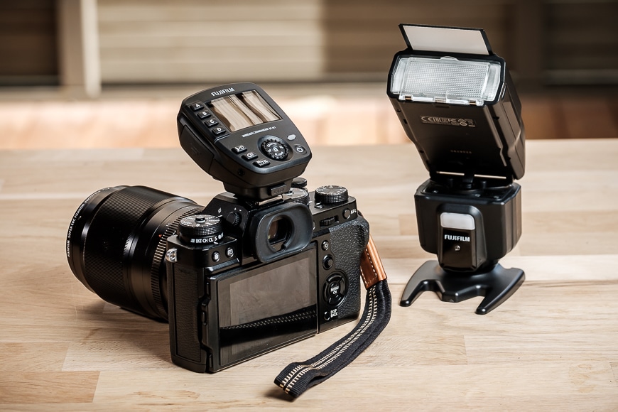 Camera, lens and speedlight