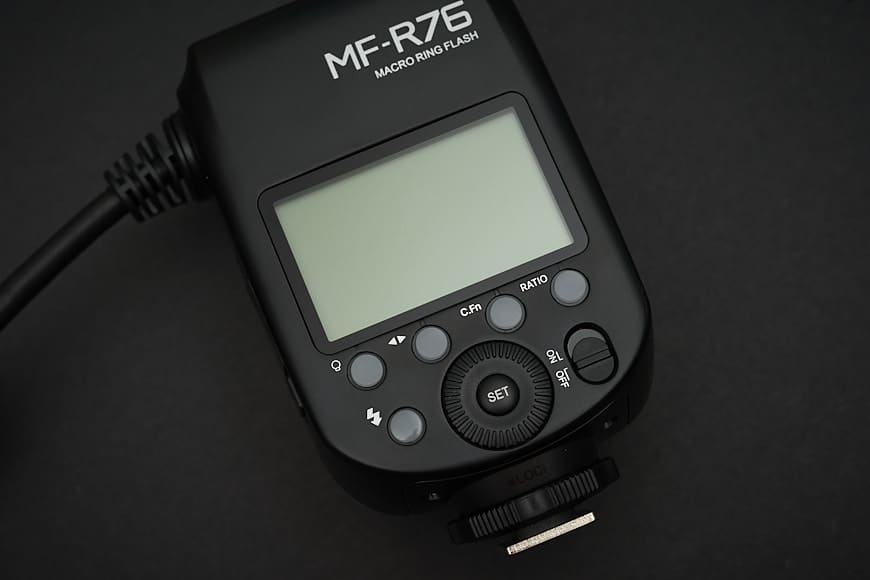 The flash control unit mounts to the speedlight mount on the camera and provides easy to use controls.