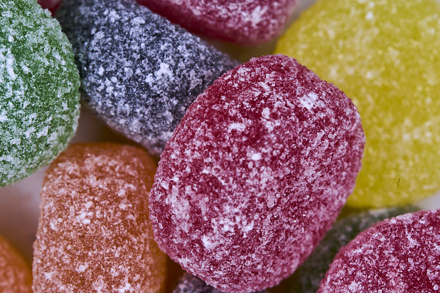 Sugar-coated gummies macro closeup