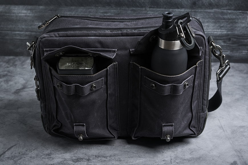 The front pockets can fit a full-sized speedlight and water bottle but this will pose some challenges in closing the bag.