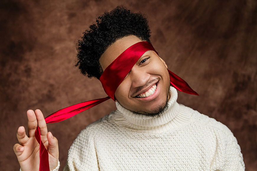 Man with ribbon over one eye