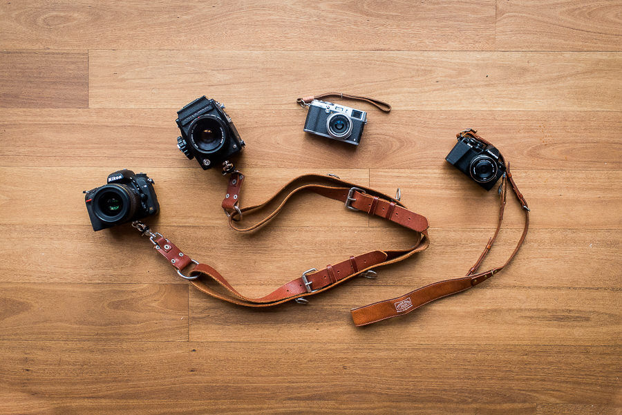 camera straps on floor