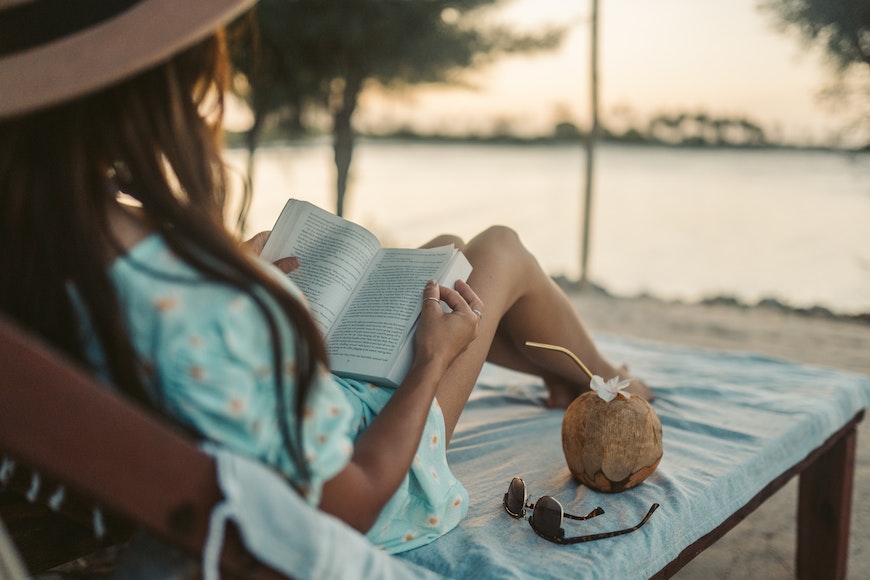 Reading book with coconut water