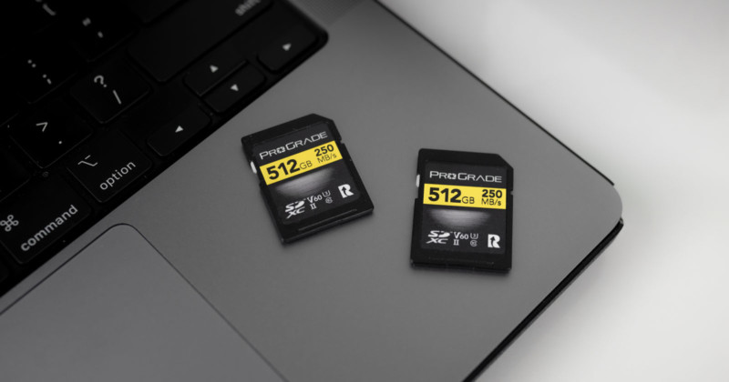 two SD cards ontop of laptop