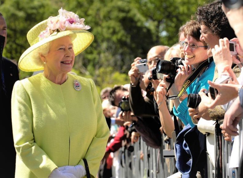 Queen Elizabeth II yellow dress and hat