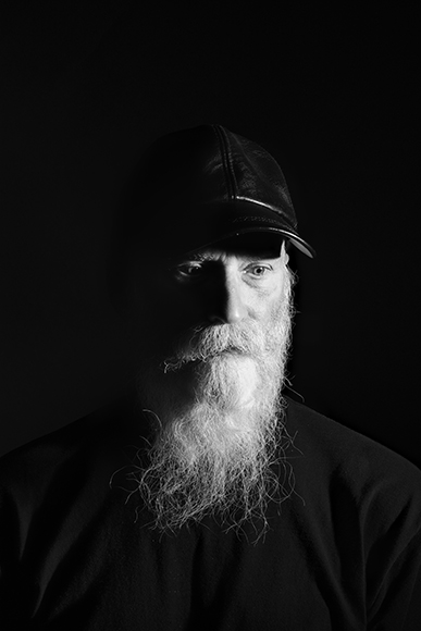 Black & white portrait of a man with beard