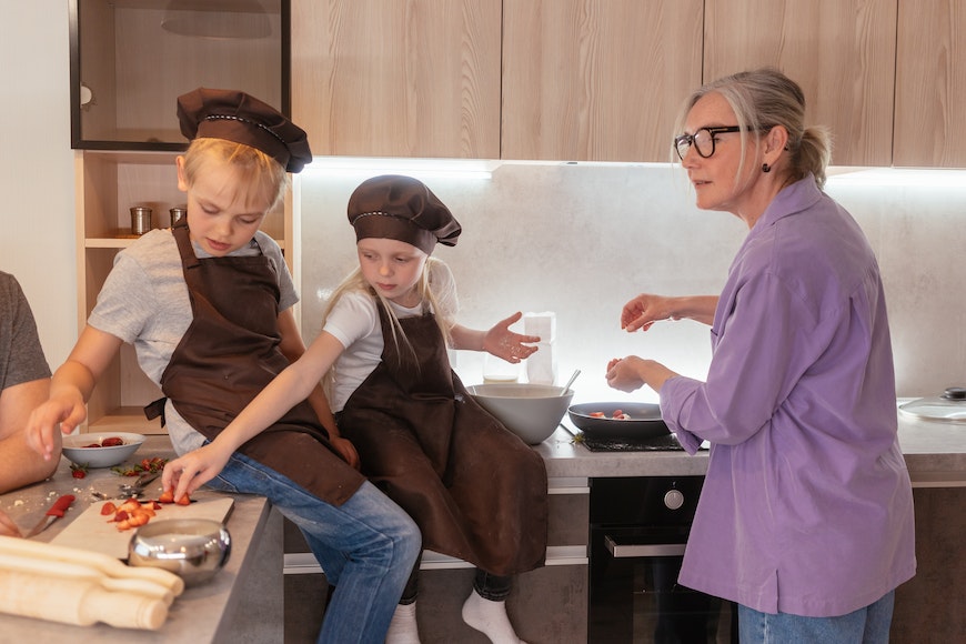 Kids cooking with aprons