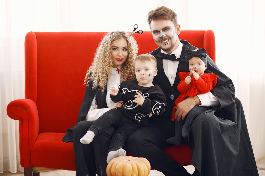 Family portrait with halloween costumes