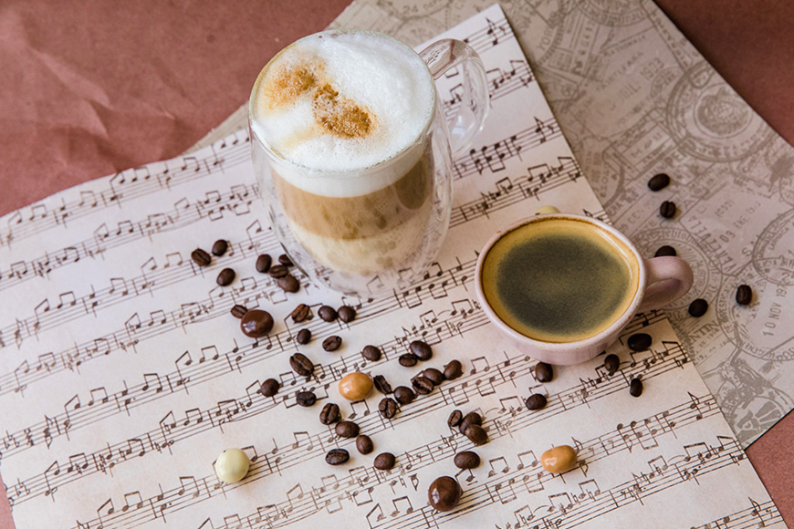 Coffee cups on music notation