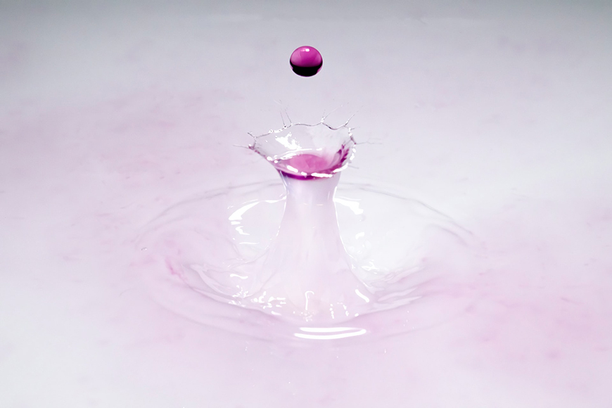 Pink droplet into white
