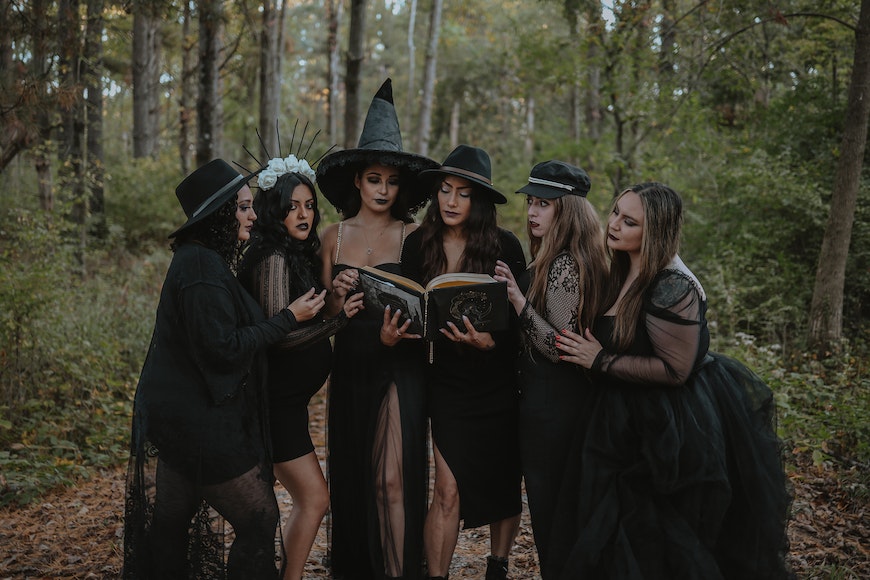 Girls dressed as coven of witches