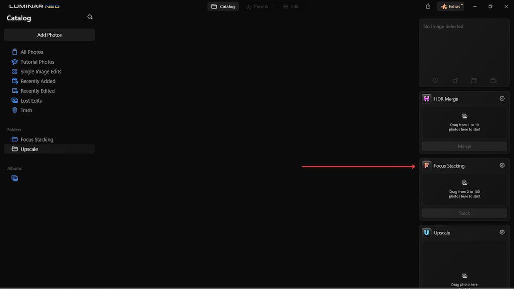a black screen with a red arrow pointing to the left.