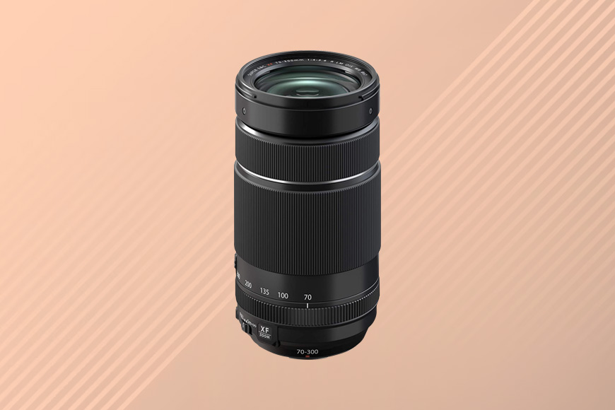 a camera lens on a tan background.