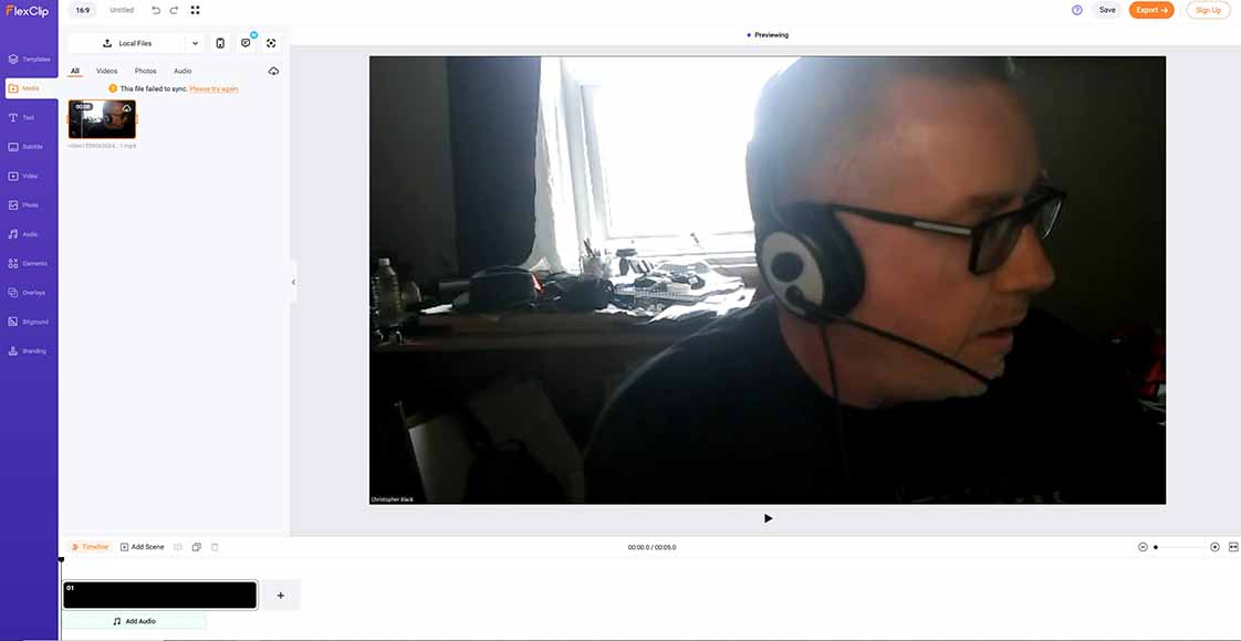 a man wearing headphones in the Flexiclip video editor