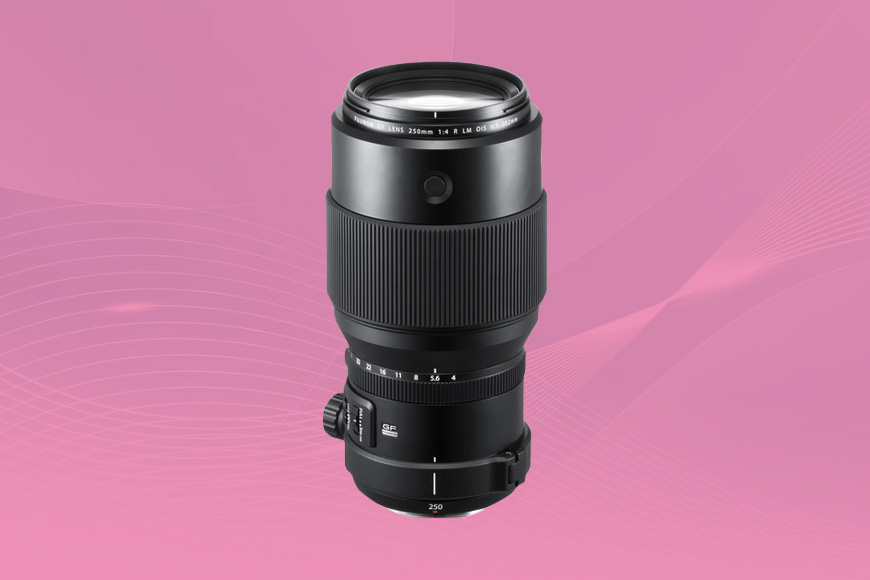 a camera lens on a pink background.