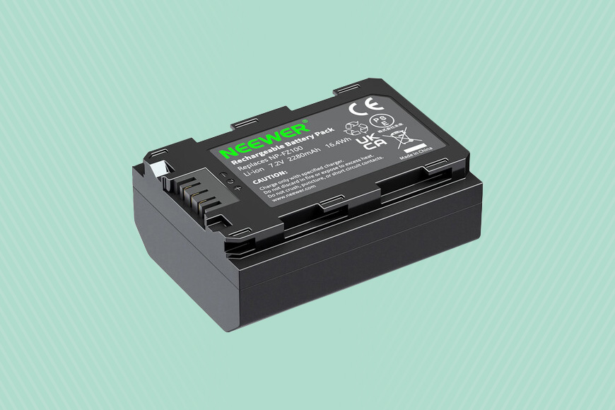a battery on a green background.