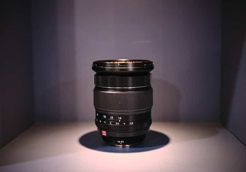 a camera lens sitting on top of a table.