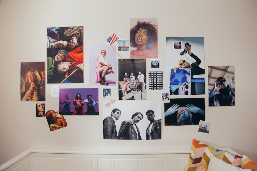 A room with a lot of pictures on the wall.