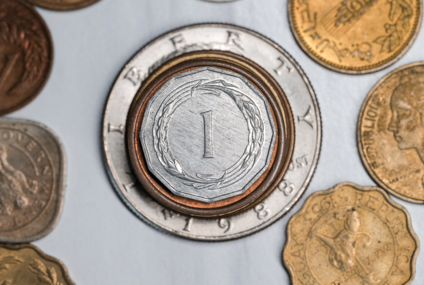 a close up of a coin on a table.