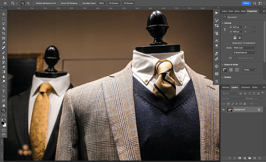 a photo of a mannequin wearing a suit and tie opened in Photoshop. 