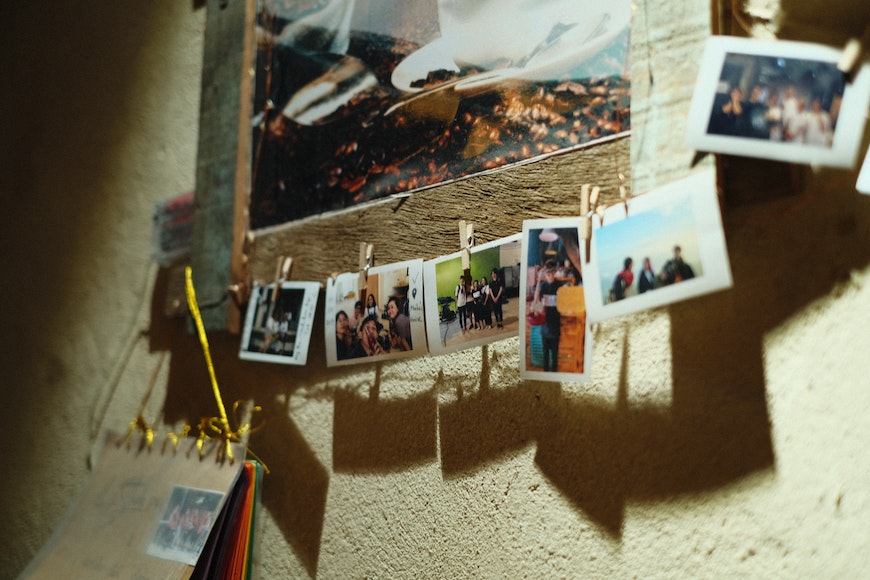 A group of photos hanging on a wall.