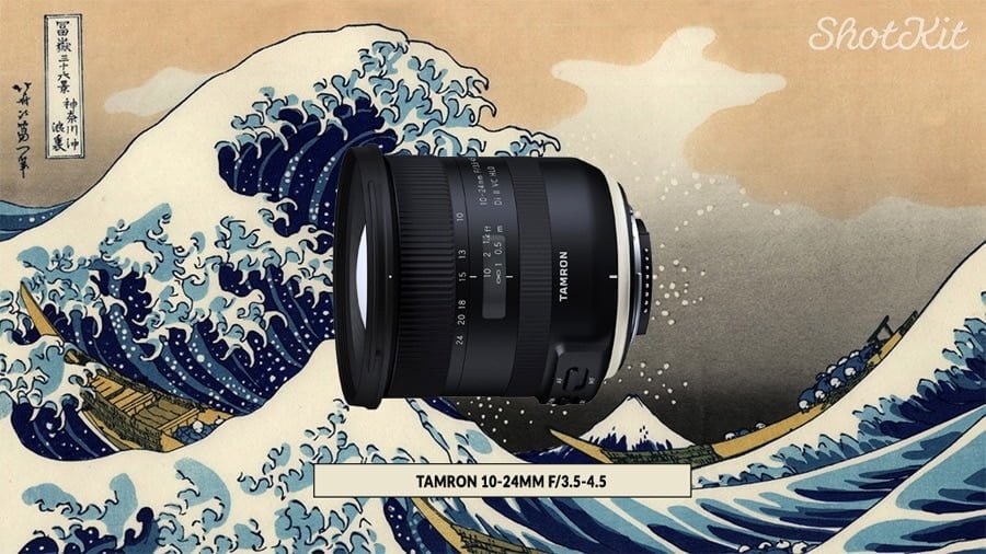 a camera lens sitting on top of a large wave.