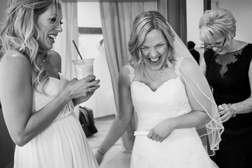 A bride laughing