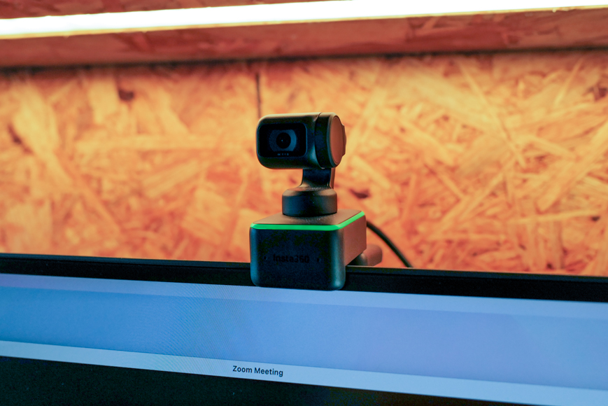a web camera is sitting on top of a monitor.
