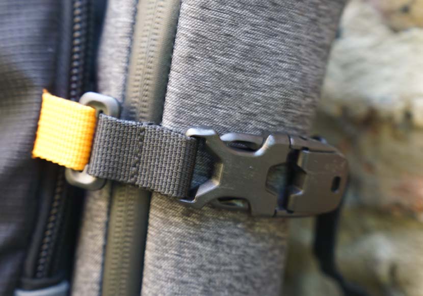 a close up of a piece of luggage showing straps and buckles.