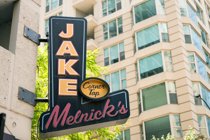 a sign for jake's mernick's on the side of a building.