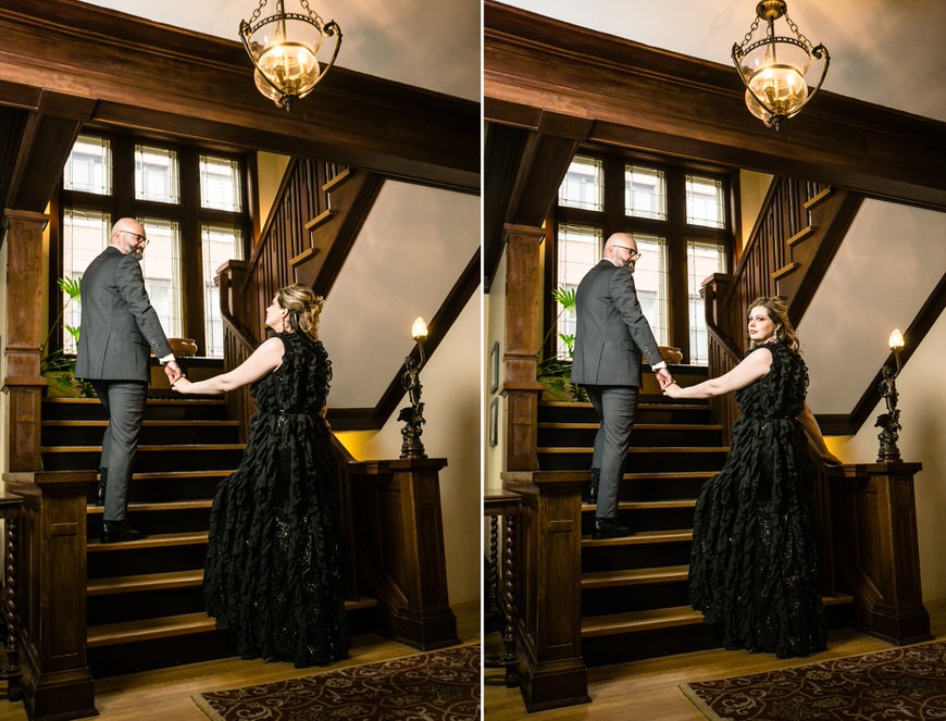 a man and a woman standing on a stair case.